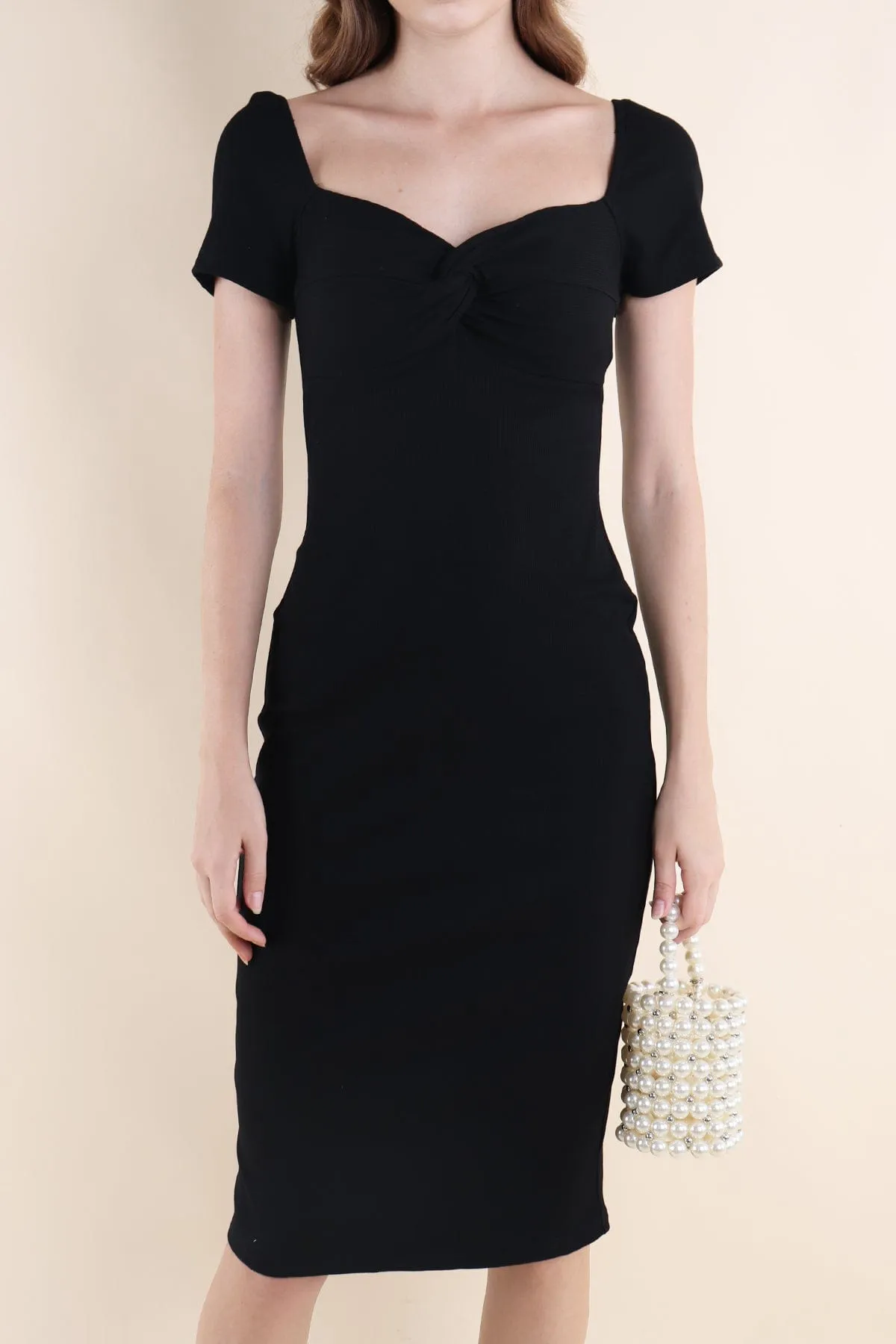 CINTRA KNOTTED RIBBED DRESS IN BLACK