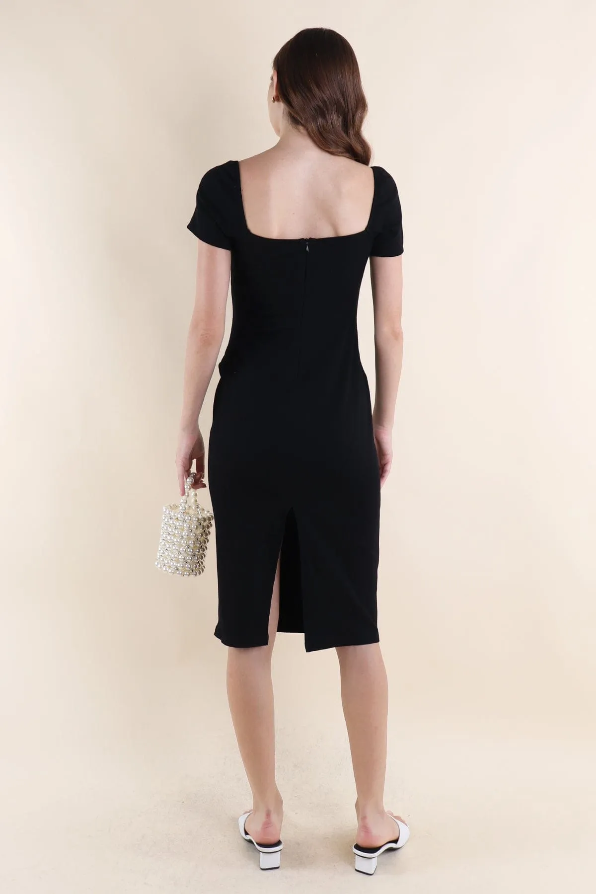 CINTRA KNOTTED RIBBED DRESS IN BLACK