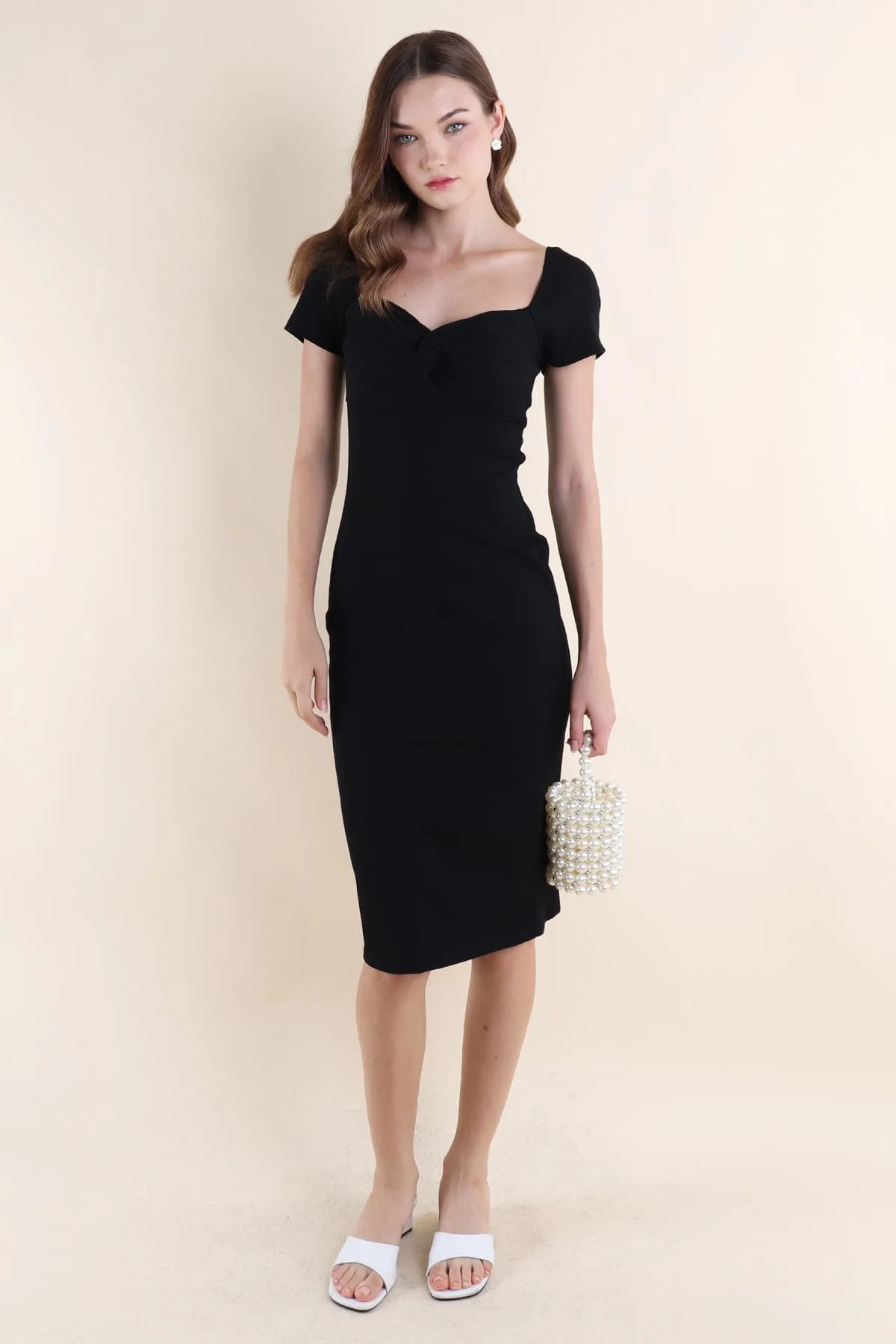 CINTRA KNOTTED RIBBED DRESS IN BLACK